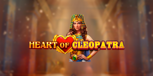 Banner promocional do jogo de slot Heart of Cleopatra. A ilustração destaca a figura da rainha egípcia Cleópatra ao centro, usando um clássico adorno de cabeça faraônico e joias de ouro. O logotipo vibrante do jogo cruza a imagem, com um grande coração vermelho de bordas douradas dividindo as palavras "HEART OF" e "CLEOPATRA" em letras amarelas. O cenário de fundo exibe o interior majestoso de um templo egípcio, com grandes colunas gravadas com hieróglifos e iluminadas por uma luz dourada com partículas brilhantes. Imagem focada na matéria de análise técnica e review para cassino online.