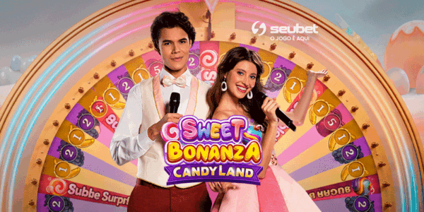 Banner promocional para análise do jogo de cassino ao vivo Sweet Bonanza CandyLand no SeuBet. No centro, um apresentador e uma apresentadora sorridentes seguram microfones à frente de uma grande roda de prêmios colorida. À esquerda, destaca-se o logotipo do recurso "Bubble Surprise". O cenário de fundo é um mundo de doces e guloseimas em tons pastéis. No topo central, encontra-se o logotipo do SeuBet. Arte focada em reviews de live casino game shows.
